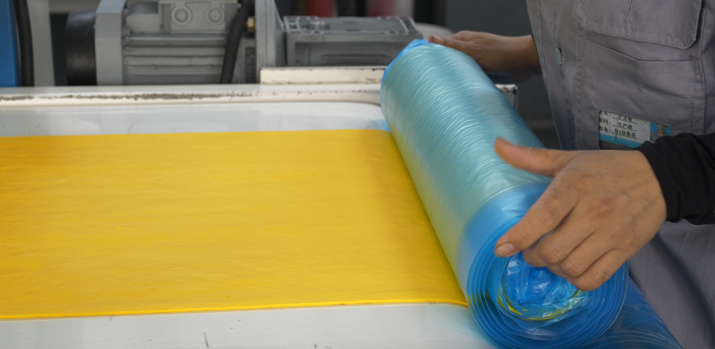  A large, neat roll of finished SaneZen FKM premix compound, showcasing consistent quality and production-scale readiness for shipment.