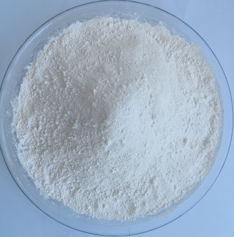 A close-up visual sample of FR67RP, a high-performance, high-temperature powder coating additive and flame retardant synergist. The image showcases the product's physical form, representing its role as a multifunctional solution designed to prevent coating peeling, yellowing, and failure under extreme heat for applications such as BBQ grills, industrial ovens, and electrical cabinets. From Shanzhen Group, a specialist in advanced material solutions for the coatings industry.