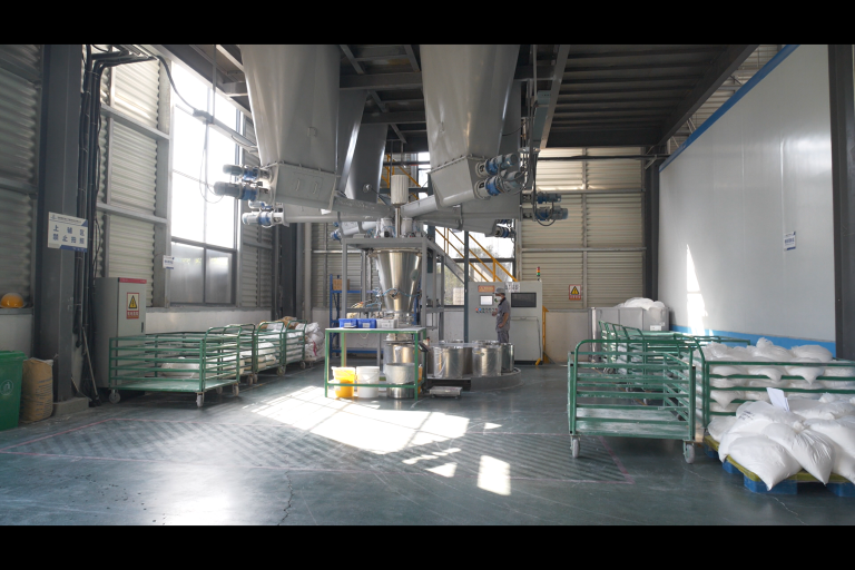 panoramic image of a spacious, bright, and orderly modern workshop of silicone rubber compound